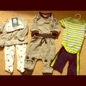 Three suits for baby plus a gift new pacifierclip